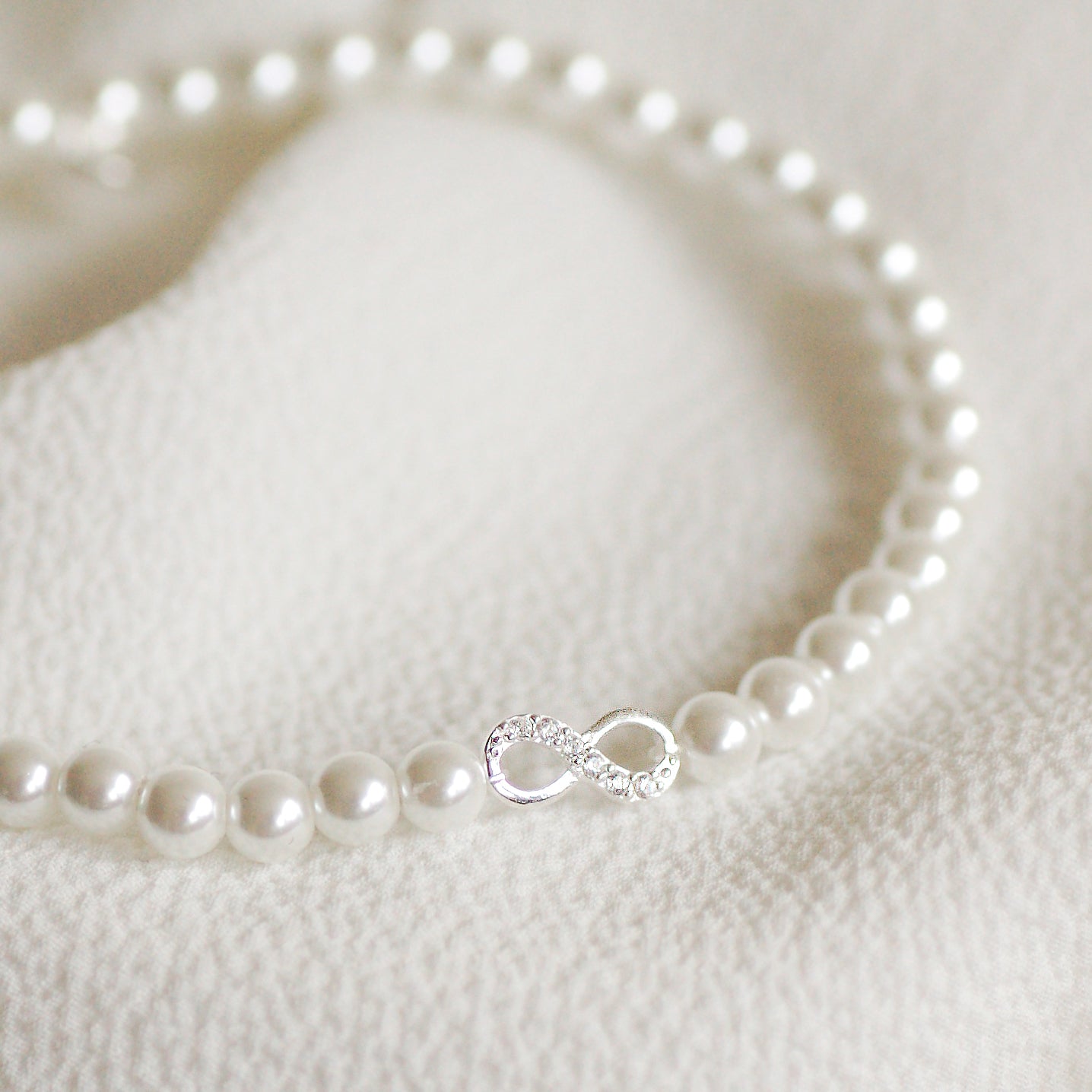 Sterling Silver Pearl Infinity Bracelet