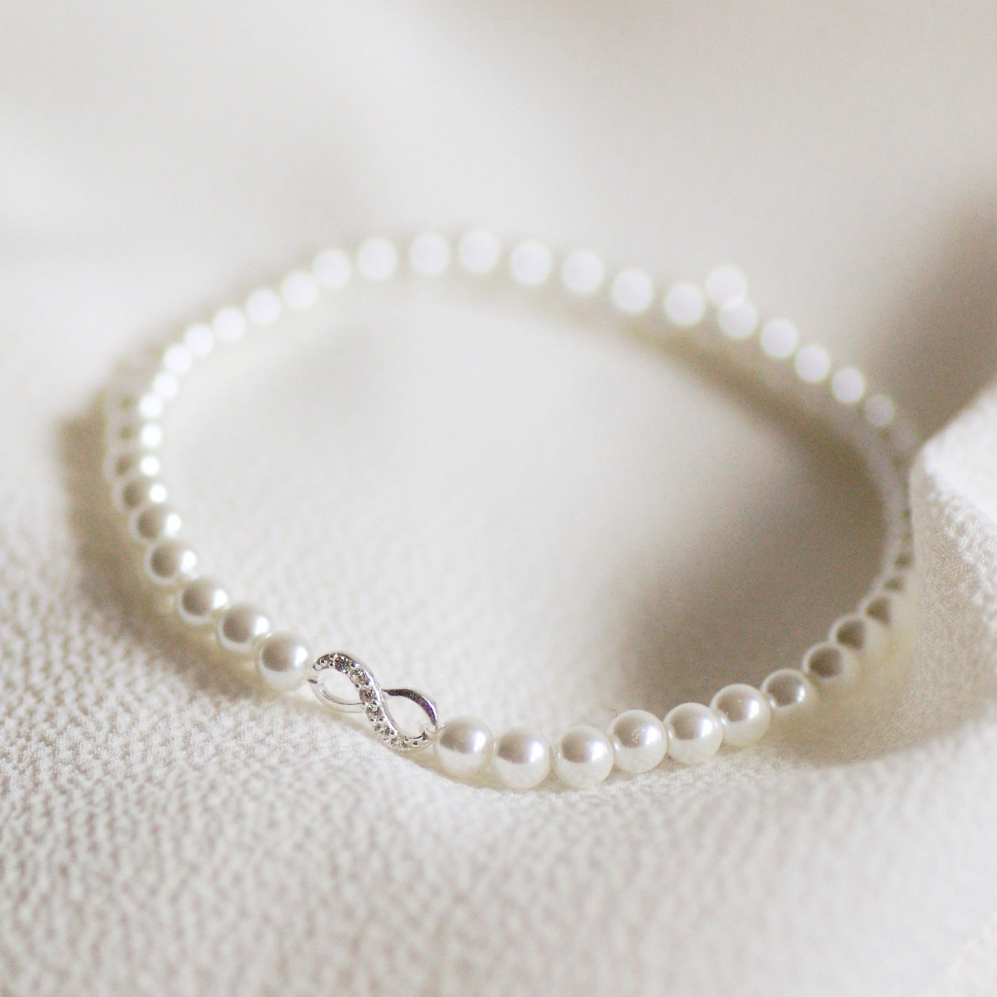 Sterling Silver Pearl Infinity Bracelet