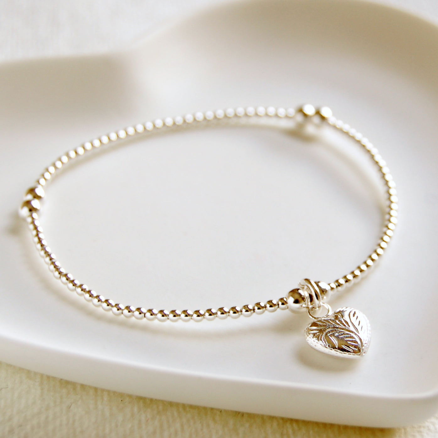 Silver Bead Bracelet with Patterned Heart Charm
